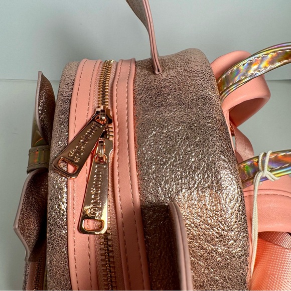 NWT. Loungefly Disney Minnie Mouse backpack. Metallic pink iridescent color - Picture 7 of 16